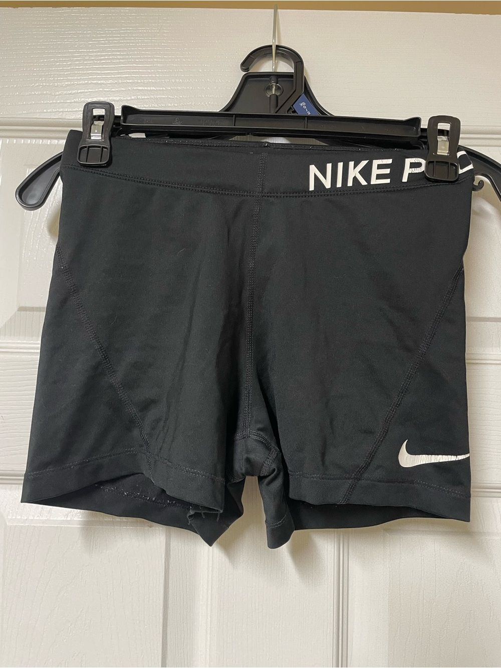 Nike Black Athletic Compression Shorts with White Swoosh
